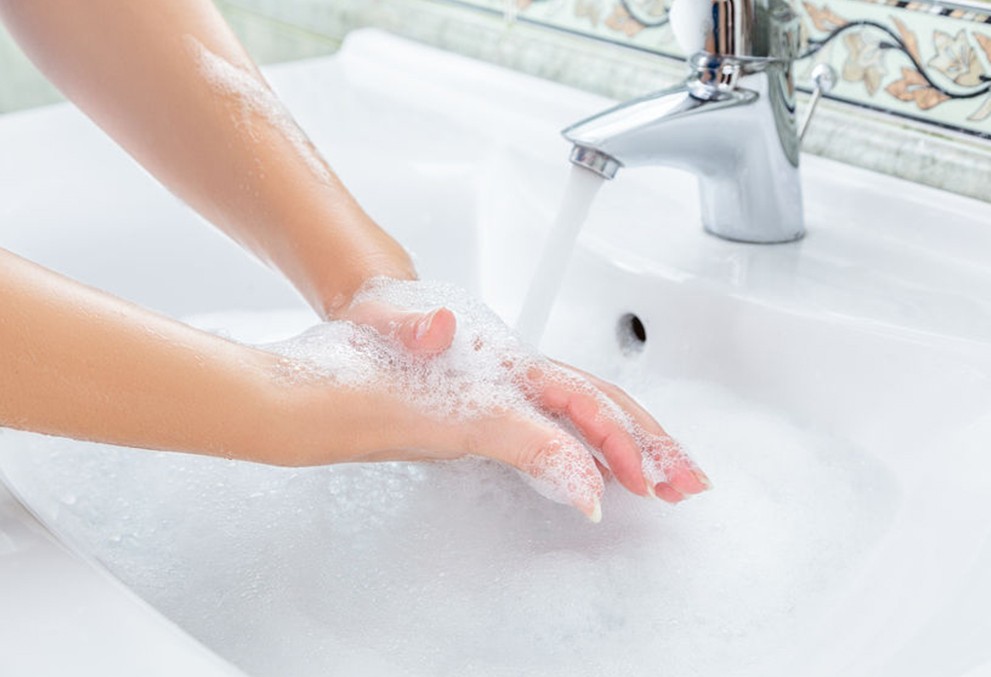 TENSIANOL brand banner - washing hands on wash basin